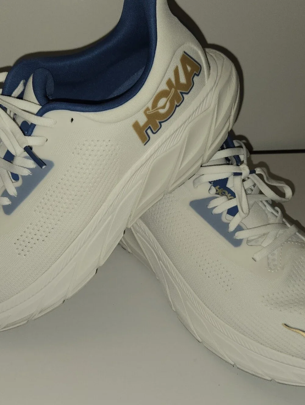 Hoka One One White and Navy Athletic Running Shoes with Gold Logo
